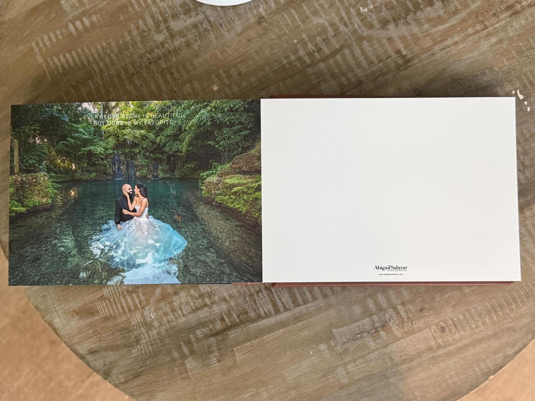 Back cover of a handcrafted wedding album featuring a couple standing in the water